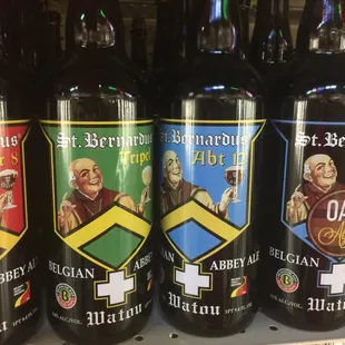 a row of beer bottles on a shelf