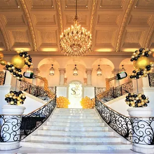 a staircase decorated with balloons
