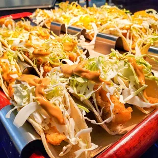 a tray of fish tacos