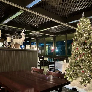 a christmas tree in the dining room