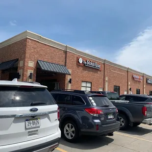 everal cars parked in front of the store