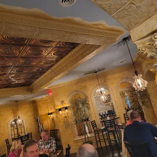 a group of people sitting at tables