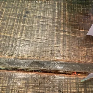 Beware of those table cracks, lots of meals and bacteria in there. Maybe some COVID?