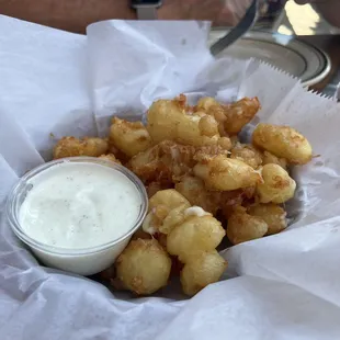 Deep fried cheese curds with a side of ranch.