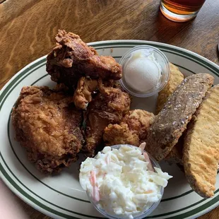 Broasted chicken with potato wedges