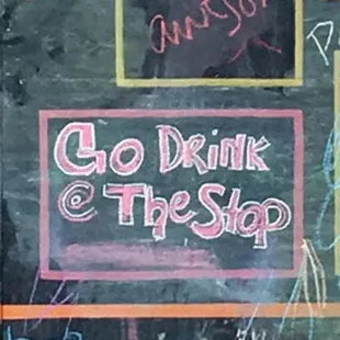 a chalk board with chalk drawings on it