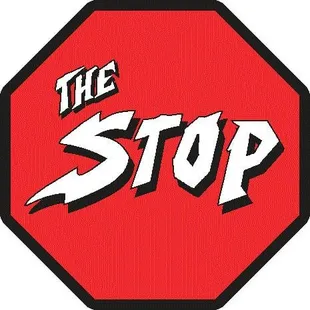 a red stop sign with the word the stop