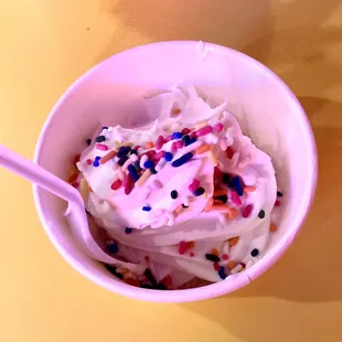 Soft-serve Vanilla ice cream with sprinkles and peanuts