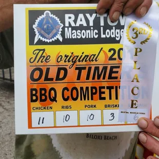  a man holding a sign