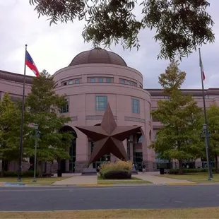 a large star in front of a building