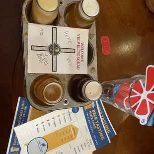 a tray of beer and a cup of coffee