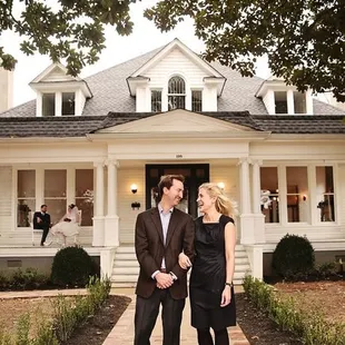 Owners Katie and Hampton Parr in front of The Stratton House. Photo by Cindy Thymius Photography