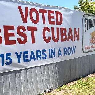 a sign that reads voted best cuban 15 years in row