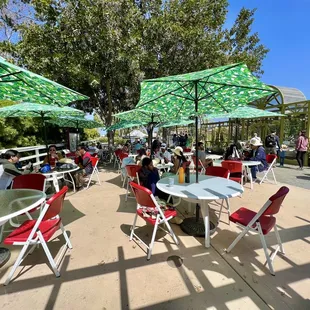 Tables with umbrellas for shade.