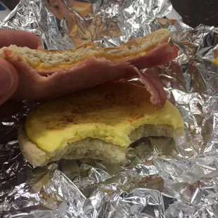 Breakfast sammich with barely toasted English muffin, pre-made egg thing, decent ham, and cheese.