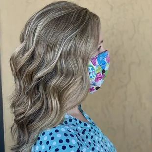 Partial highlights and a beachy wave style by Shamine Adams.