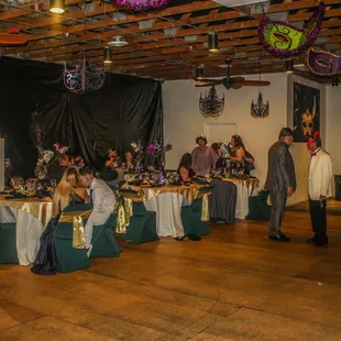 a man standing in front of a room full of people