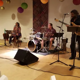 a group of people playing instruments