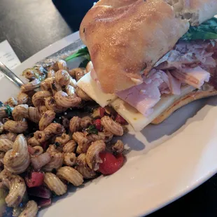 Turkey, bacon and avocado sandwich with a pasta salad. I asked for the added pepper jack cheese.
