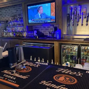a bar with beer taps