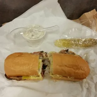 Pastrami on white. Comes with choice of tater or macaroni salad.  Also comes with pickle.  Much good.