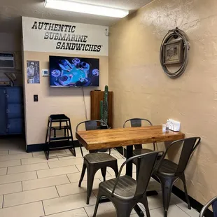 Table seating inside with a television