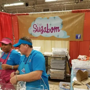 a man and a woman preparing food