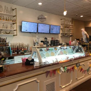 A view of the ice cream cases.  You can see the menu boards and to the upper left, some of the soda flavors.