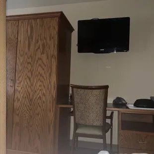 Bed dresser desk in my room 406