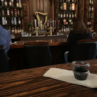 a glass of wine on the bar