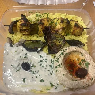 Plate with hummus and yogurt cucumber salad/dip