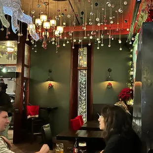 a man and a woman sitting at a bar