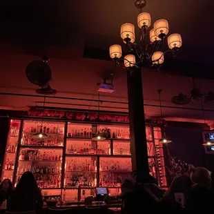 people sitting at a bar