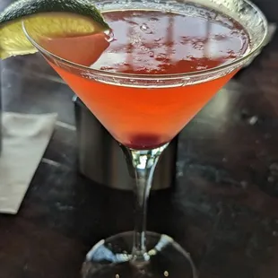 a cocktail in a martini glass