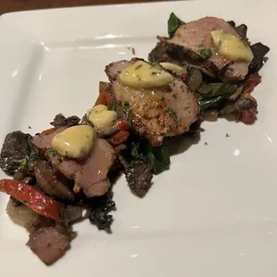 Pork Tenderloin in a bed of mushroom hash