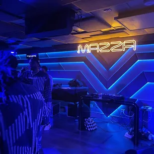 a band playing in a dimly lit room