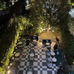 a checkered patio at night