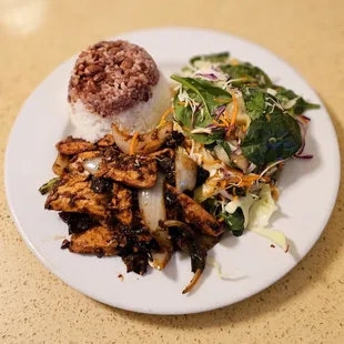 Spicy Lemongrass Chicken - chicken strips sauteed w/ wood ear mushrooms, onions, lemongrass &amp; chilli. Served w/ salad &amp; multigrain rice