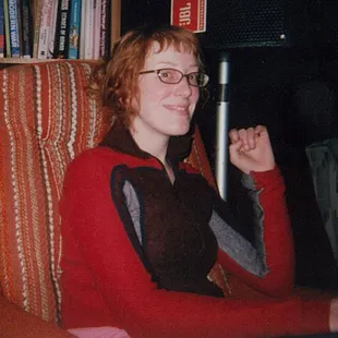 a woman sitting in a chair