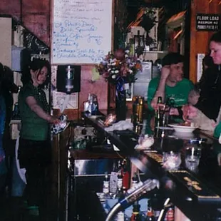 a group of people at the bar