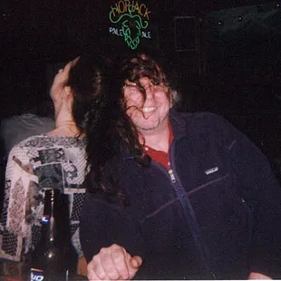 a man sitting at a bar