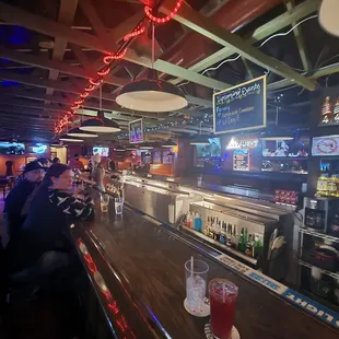 a woman sitting at the bar