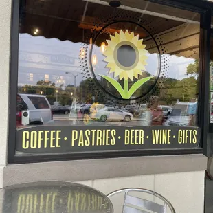 the front window of a coffee shop