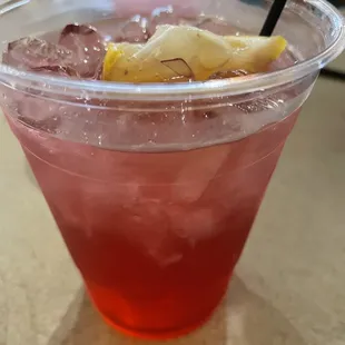 a drink in a plastic cup