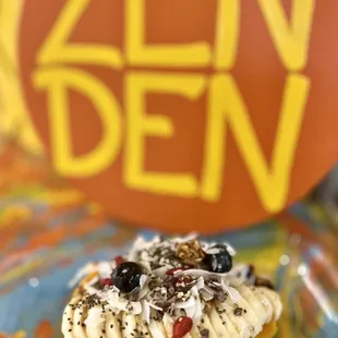 Papaya Bowl: GF granola, peanut butter, banana, blueberries, chai seeds, cacao nibs, hemp seeds, coconut flakes, organic honey.