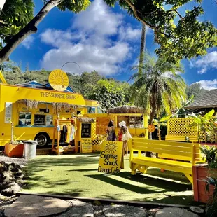 a bright yellow food truck