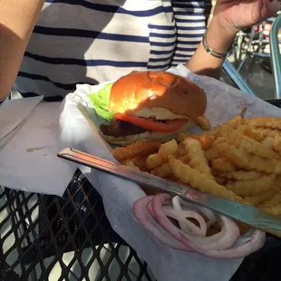 Burger with pepper jack and deep fried crinkle cut fries