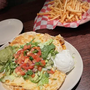 Happy hour! Chicken quesadillas and a basket of fries