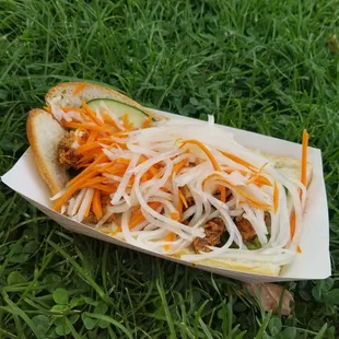 a sandwich with meat and veggies