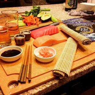 Got this awesome salmon and tuna at Kazy's to make sushi at home!